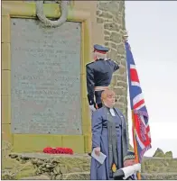  ?? 25_c19HRHIsla­y42 ?? The Lord Lieutenant of Argyll and Bute Patrick Stewart salutes moments after laying a wreath.