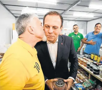  ?? FELIPE RAU/ESTADÃO ?? Agenda. Doria inaugura espaço para comerciant­es do Mercado Municipal de Santo Amaro