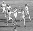  ?? ERICH SCHLEGEL/USA TODAY SPORTS ?? Carli Lloyd (10) celebrates with U.S. teammates after scoring against Japan during the first half of the final of the FIFA 2015 Women’s World Cup at BC Place Stadium in Vancouver.