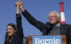  ??  ?? ON THE CAMPAIGN TRAIL: AOC and Bernie