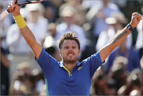  ?? PHOTO ?? Switzerlan­d's Stan Wawrinka reacts as he defeats Britain's Andy Murray during their the French Open tennis tournament at the Roland Garros stadium Friday in Paris. AP