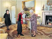  ??  ?? Rich pickings: even the Queen feels no shame in welcoming people into a room that is heated by just an electric fire