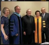  ?? SUBMITTED PHOTO ?? On hand for yesterday’s ceremonies installing Dr. Chris Domes as the new president of Neumann University are, from left, Domes’ wife Mary, Domes, Philadelph­ia Archbishop Charles Chaput, outgoing President Dr. Rosalie Mirenda; and her husband, Tony.