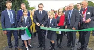  ??  ?? The A21 between Tonbridge and Pembury has expanded 2.5 miles of road to two lanes; right, the dualling is officially opened