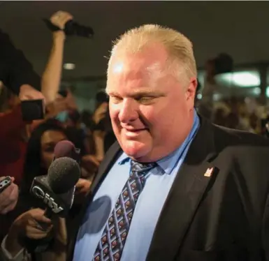  ?? GEOFF ROBINS/AFP/GETTY IMAGES ?? Rob Ford was wary of the media, which he may have seen a tool of the snooty elites he opposed, John Semley writes.