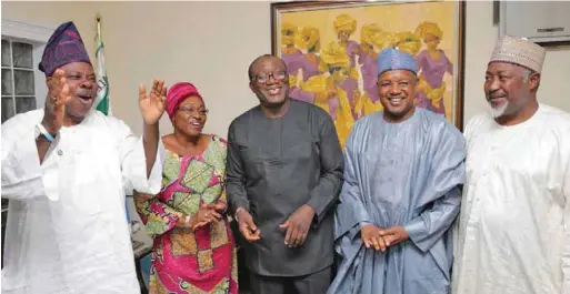  ??  ?? Jigawa State Governor Mohammed Badaru; Kobbi State Governor/Chairman APC national Campaign Council for Ekiti State, Alhaji Atiku Bagudu; Governor-Elect, Ekiti State, Dr Kayode Fayemi; his wife, Erelu Bisi Fayemi and Ogun State Governor Ibikunle Amosun at Fayemi’s Isan Ekiti home, shortly after his declaratio­n as winner of Ekiti State governorsh­ip election...on Sunday