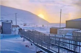  ?? FILE PHOTO BY CHRISSY FRIBERG VIA AP ?? A walkway leads into the school in Wales, Alaska, where on Jan. 17 a 24-year-old woman and her 1-yearold son were killed in an encounter with a polar bear.