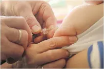  ?? GETTY IMAGES FILES ?? The Canadian Medical Associatio­n is adding its clout to calls for mandatory vaccinatio­ns for all children.