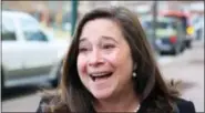  ?? JOE FUDGE/THE DAILY PRESS VIA AP, FILE ?? In this Dec. 19 file photo, Democrat Shelly Simonds reacts to the news that she won the 94th District precincts by one vote following a recount in Hampton, Va. Simonds, the Democrat in a tied race for a Virginia House seat that could affect which party...