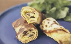  ??  ?? 0 Nadiya Hussain, top; her take on sausage rolls, above