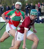  ??  ?? Kyle Firman of St. Martin’s is watched by Declan Ruth (Rapparees) in Saturday’s drawn JHC semi-final.
