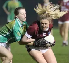  ??  ?? A hair-raising experience for Becky Hamilton (St. Martin’s) as she tries to find a route past HWH-Bunclody’s Yvonne Kelly.