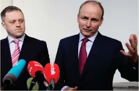  ??  ?? Plans: Micheál Martin with fellow FF TD Thomas Byrne yesterday