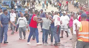  ?? (File pic) ?? A violence incident that took place after an MTN Premier League game between Mbabane Highlanger­s and Swallows in December last year.