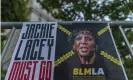  ??  ?? A banner posted by Black Lives Matter Los Angeles. Photograph: Damian Dovarganes/AP