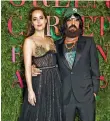  ?? Reuters; Gucci ?? Colin and Livia Firth, left; above, Dakota Johnson and Alessandro Michele of Gucci at the awards