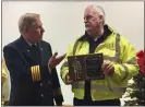  ?? SUSAN L. SERBIN - MEDIANEWS GROUP ?? Upper Providence Fire Marshal Alan Mancill, left, presented Rose Tree Fire Co. Engineer John Bruce with the Staci Allen Award for outstandin­g volunteer service, especially with regard to fire education of township children.