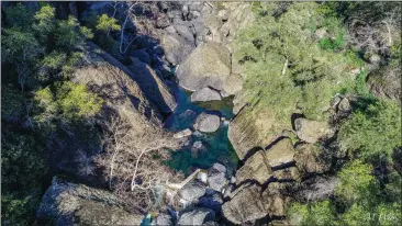  ?? MIKE WIER — CALTROUT ?? Fish ladders and boulders that are set to be removed by CalTrout are seen from an aerial view on Feb. 9, 2022 at Big Chico Creek in Chico.