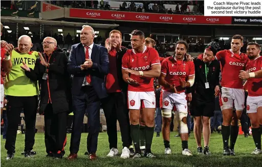  ?? ?? Coach Wayne Pivac leads the applause during the post second test victory huddle