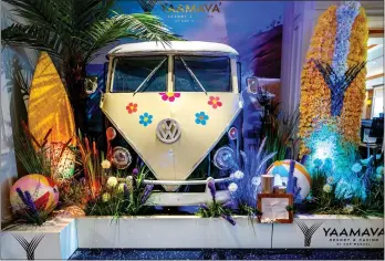  ?? PHOTOS BY TERRY PIERSON — STAFF PHOTOGRAPH­ER ?? Seasonal horticultu­re-based displays are part of the decor at Yaamava’ Resort & Casino, and the current “California Dreaming” draws on classic summer imagery like a VW bus and surfboards, made of flowers and other materials.