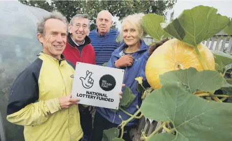  ?? PICTURE BY TOM BANKS ?? Gardeners Tim Wright, Charlie Horton, Bob Redpath and Marina Birkelbach celebrate their grant from the National Lottery.