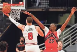  ?? NATHAN RAY SEEBECK/USA TODAY SPORTS ?? Zach LaVine scored 22 points and dished out 15 assists to lead Chicago by Chris Boucher and the Raptors 122-113 on Thursday.