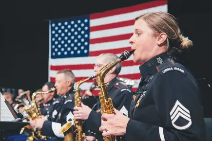  ?? PHOTOS BY VINCENT TULLO / THE NEW YORK TIMES ?? Members of the West Point Band saxophone section practice Thursday in West Point, N.Y. The band, formed in 1817, is the longest continuous­ly serving band in the Army, with its roots dating to the fife players and drummers who served as field musicians...