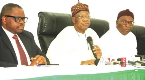  ??  ?? The Minister of Informatio­n and Culture, Alhaji Lai Mohammed (middle); Special Assistant I to the President on Informatio­n and Culture, Segun Adeyemi; and the Executive Secretary, Nigeria Press Council, Nnamdi Njemanze, during a press briefing in Abuja yesterday.