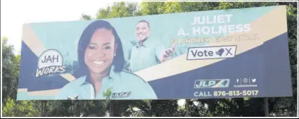  ??  ?? A billboard for Juliet Holness was still up last weekend in Bull Bay in her constituen­cy.