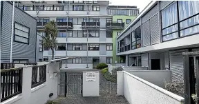  ?? MONIQUE FORD/STUFF ?? The Tasman Gardens apartment building is one of many in Wellington where owners are selling up and soon moving out because of earthquake and watertight issues.