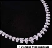  ??  ?? > Diamond fringe necklace