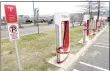  ?? Hearst Connecticu­t Media file photo ?? Tesla chargers in the parking lot of the Connecticu­t Post mall in Milford.
