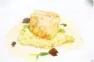 ??  ?? Chilean sea bass with saffron risotto, Madeira mushroom broth
