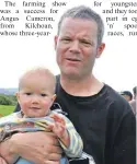  ??  ?? One-year- old Sonny Emerson was supporting­dad, Bob, in the heavyweigh­t competitio­ns