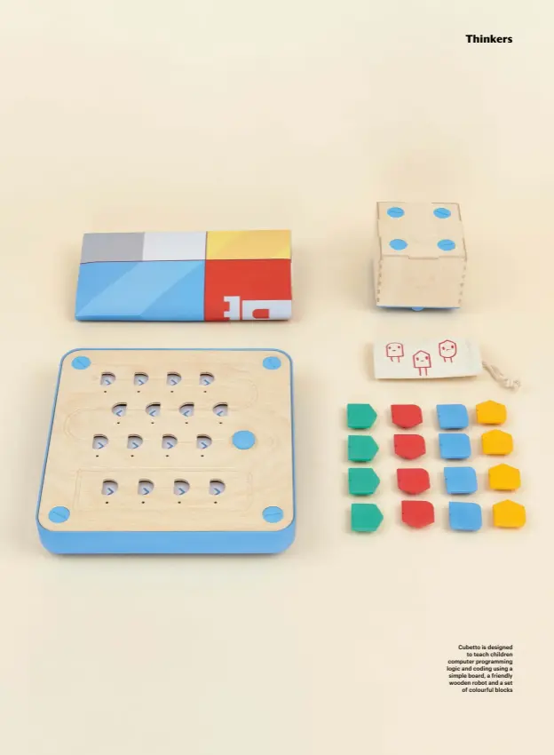  ??  ?? Cubetto is designed to teach children computer programmin­g logic and coding using a simple board, a friendly wooden robot and a set of colourful blocks