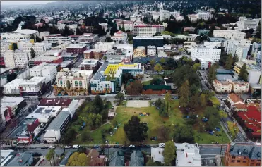  ?? JANE TYSKA — STAFF PHOTOGRAPH­ER ?? Homeless tents are seen in People’s Park on Feb. 9. UC Berkeley students are occupying the park in protest of the university’s proposed project to build student housing there. That project and others will be part of a public school online forum next week.