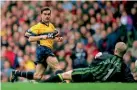  ?? ?? Match-winner…Marc Overmars scores past Peter Schmeichel