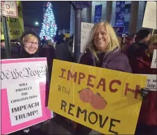  ?? PETE BANNAN - MEDIANEWS GROUP ?? Susan Callahan of East Goshen and Connie Scanga of Malvern rally for impeachmen­t on the steps of the historic Chester County Courthouse Tuesday evening.