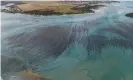  ??  ?? Leaked oil on the surface of water around the coast of Mauritius. Photograph: AFP/ Getty Images