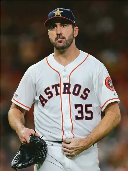  ?? Yi-Chin Lee / Staff photograph­er ?? Justin Verlander calls it a day after the seventh inning Friday. He allowed four runs but also reached 18th in career strikeouts.