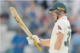  ?? Picture: Getty. ?? Australia’s Marnus Labuschagn­e celebrates his half century in the second Test.