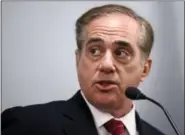  ?? CHARLES KRUPA — ASSOCIATED PRESS FILE PHOTO ?? Secretary of Veterans Affairs David Shulkin is touting an overhaul plan to give veterans even wider access to outside doctors than under its troubled Veterans Choice health care program. He is stressing stronger ties with the private sector, even while...