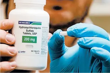  ?? GEORGE FREY/GETTY-AFP ?? Hydroxychl­oroquine, a drug normally used to combat malaria, was touted by President Trump to combat the coronaviru­s.