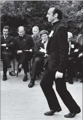  ??  ?? Siamsa Tíre founder member Fr Pat Ahern dancing at the sod turning ceremony for Teach Siamsa in Finuge in 1973, with Bishop Casey seated among the guests.