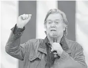  ?? Brynn Anderson / Associated Press ?? Former White House strategist Steve Bannon urges voters to turn out for Senate candidate Roy Moore during a rally Monday in Midland City, Ala.