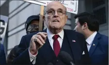  ?? AP PHOTO/JOSE LUIS MAGANA, FILE ?? A jury awarded $148 million in damages on Friday to two former Georgia election workers who sued former Mayor of New York Rudy Giuliani for defamation over lies he spread about them in 2020 that upended their lives with racist threats and harassment.