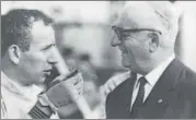  ?? GETTY IMAGES ?? Italian race car driver and businessma­n Enzo Ferrari (right) with driver John Surtees at the Monza racetrack in 1963.