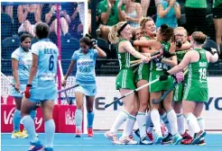  ??  ?? Ireland players celebrate a goal against India in their Pool B match of the Hockey World Cup in London on Thursday. Ireland won 1-0.