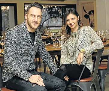  ?? Picture: ADRIAN DE KOCK ?? COOKING: South African cricket star Faf du Plessis and his wife, Imari Visser, at Bistro 13 in Stellenbos­ch. Du Plessis owns 20% of the restaurant — a ’nice hobby’, he says, after internatio­nal touring gave him a taste for fine food