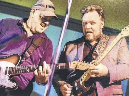  ?? SUBMITTED ?? Former Lincolns member Barry Ryan, left, is seen performing with Charlie A’court during a band reunion last September in Truro.